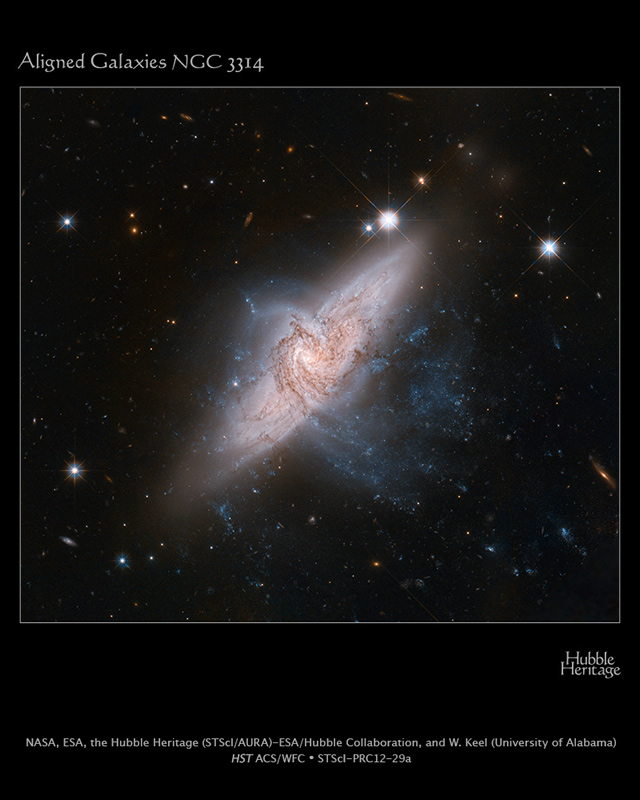 Hubble - Effetto Ottico: Allineamento fra due galassie non una collisione cosmica - Hubble: Chance Alignment Between Galaxies Mimics a Cosmic Collision